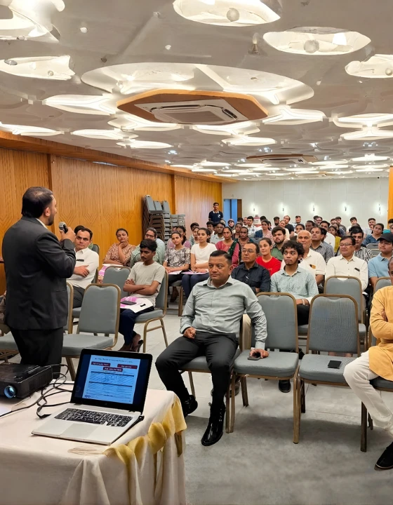 Expert addressing students in seminar on MBBS admission abroad, helping choose best country to do MBBS for Indian students and understand fees and study options abroad