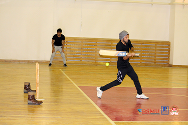 Students playing indoor cricket at Bashkir State Medical University highlighting student life with affordable MBBS, hostel facilities, cultural activities, and a friendly campus environment in Russia.
