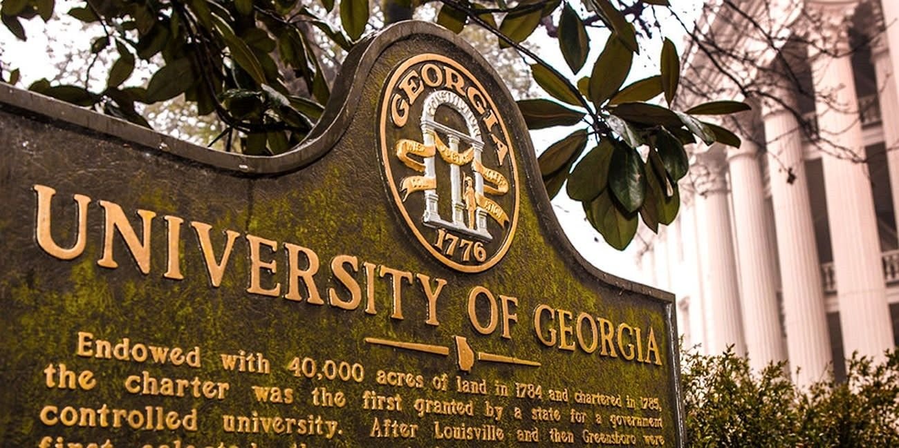 University of Georgia entrance sign with official seal in Athens, GA, representing campus location, address details, and facilities available for international students.