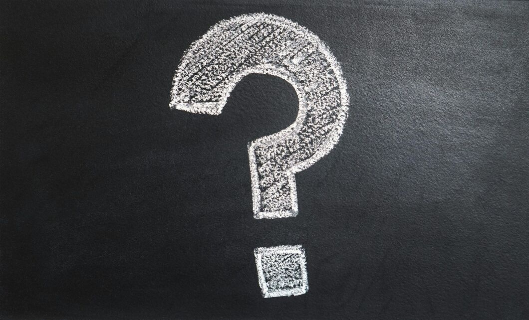 Question mark on a blackboard representing key reasons to choose AMA School of Medicine Philippines, including affordable fees, approved medical education, modern laboratories, student security, and international career opportunities