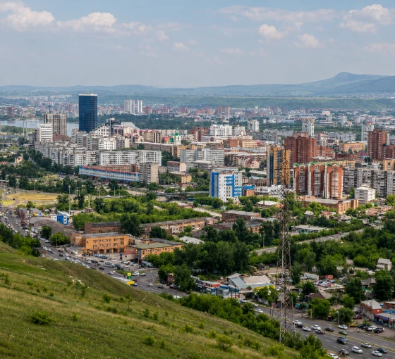 View of Krasnoyarsk city in Russia, showing the student-friendly environment, public transport, affordable living, and daily life near Krasnoyarsk State Medical University.